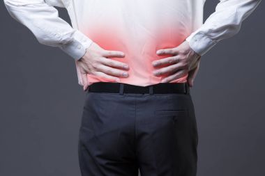 Back pain, kidney inflammation, ache in man's body clipart