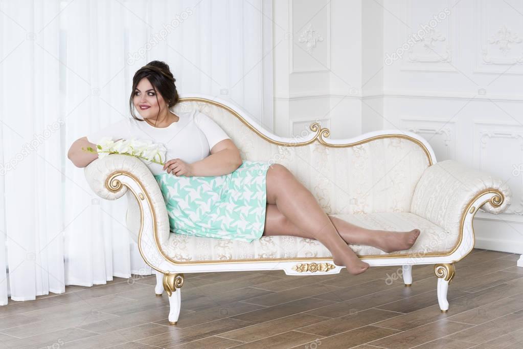 Plus size fashion model, fat woman on luxury interior, overweight female body