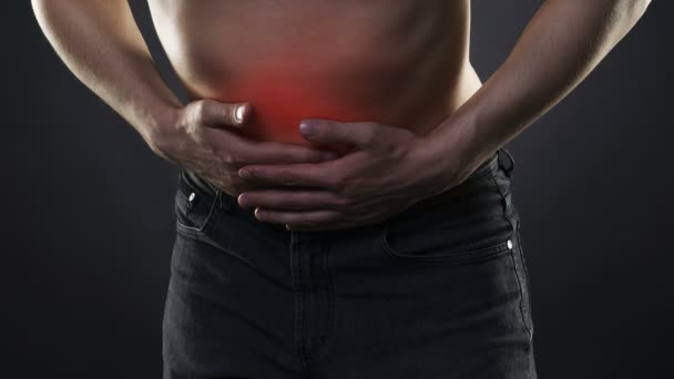 Man Abdominal Pain Stomach Ache Black Background Red Dot — Stock Video