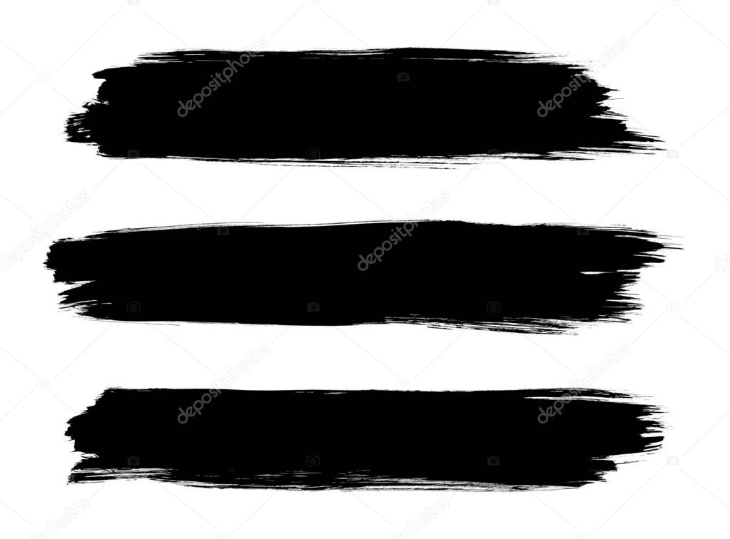 Black painted brush strokes isolated on a white background