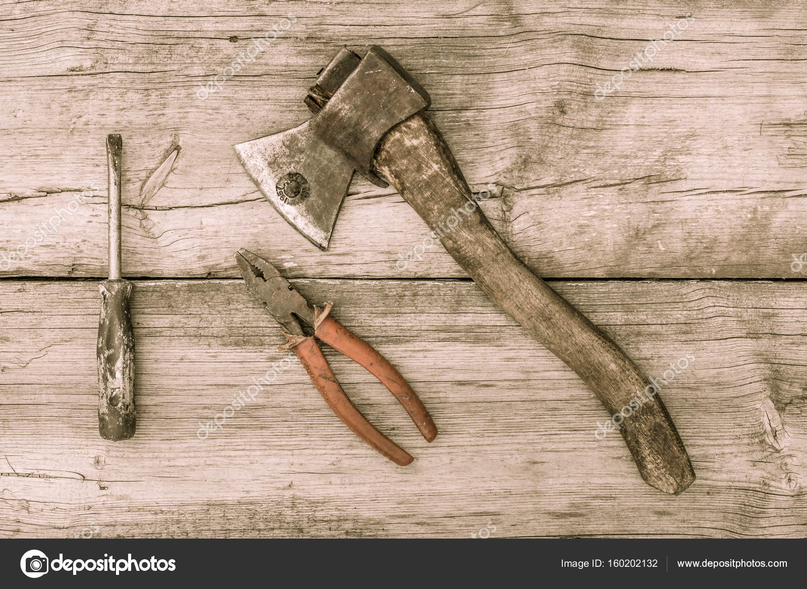 Old Stained Axe Pliers And Driver On Wooden Surface Old Tools On Wooden Background Stained Axe Pliers And Driver Surface Vintage Style Photo By Mvg68