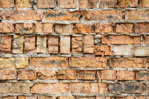 Czerwony mur z cegły roztworem rozmazany cementu — Zdjęcie stockowe