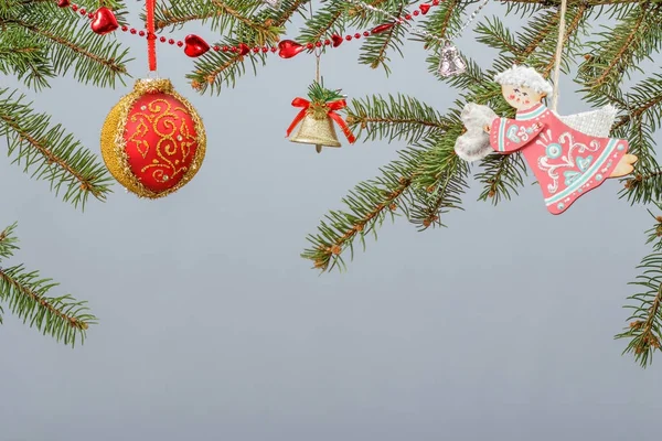 Branches of fir tree with Christmas ornament — Stock Photo, Image