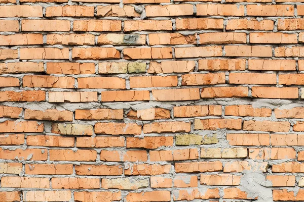 Czerwony mur z cegły roztworem rozmazany cementu — Zdjęcie stockowe