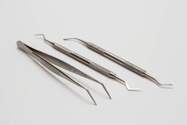 Set of metal dental instruments for teeth dental care