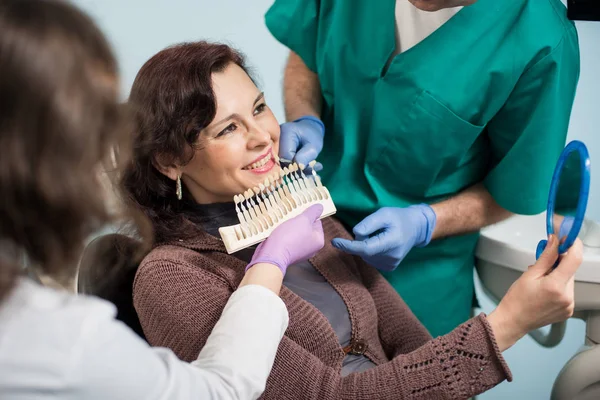 woman in dental clinic office.