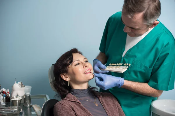 Dentist and female patient