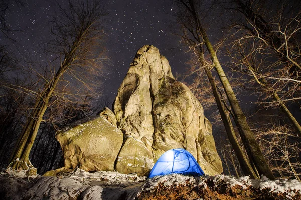 Winter camping in the mountains. Night photography