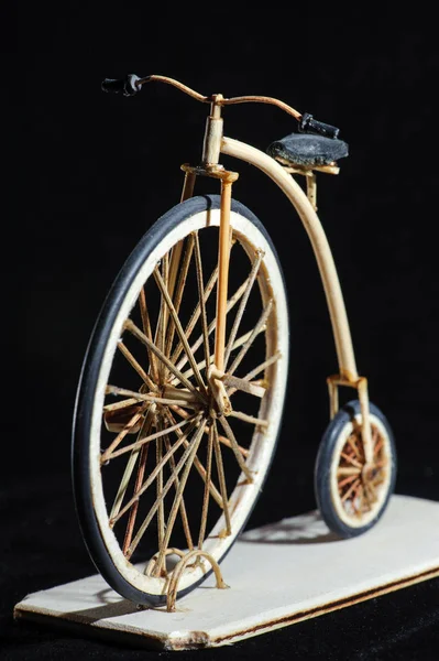 Wooden miniature of penny-farthing bicycle