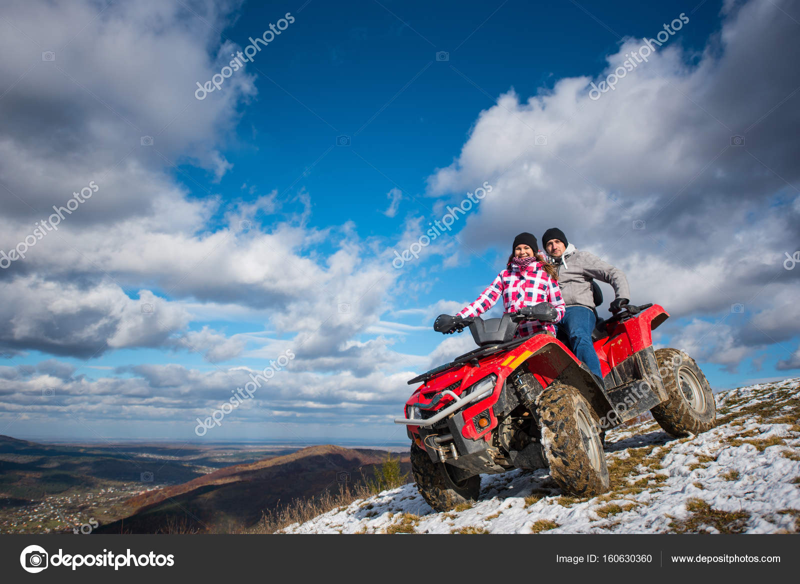 Couple on four-wheeler ATV in mountains Stock Photo by ©anatoliy_gleb  160630360
