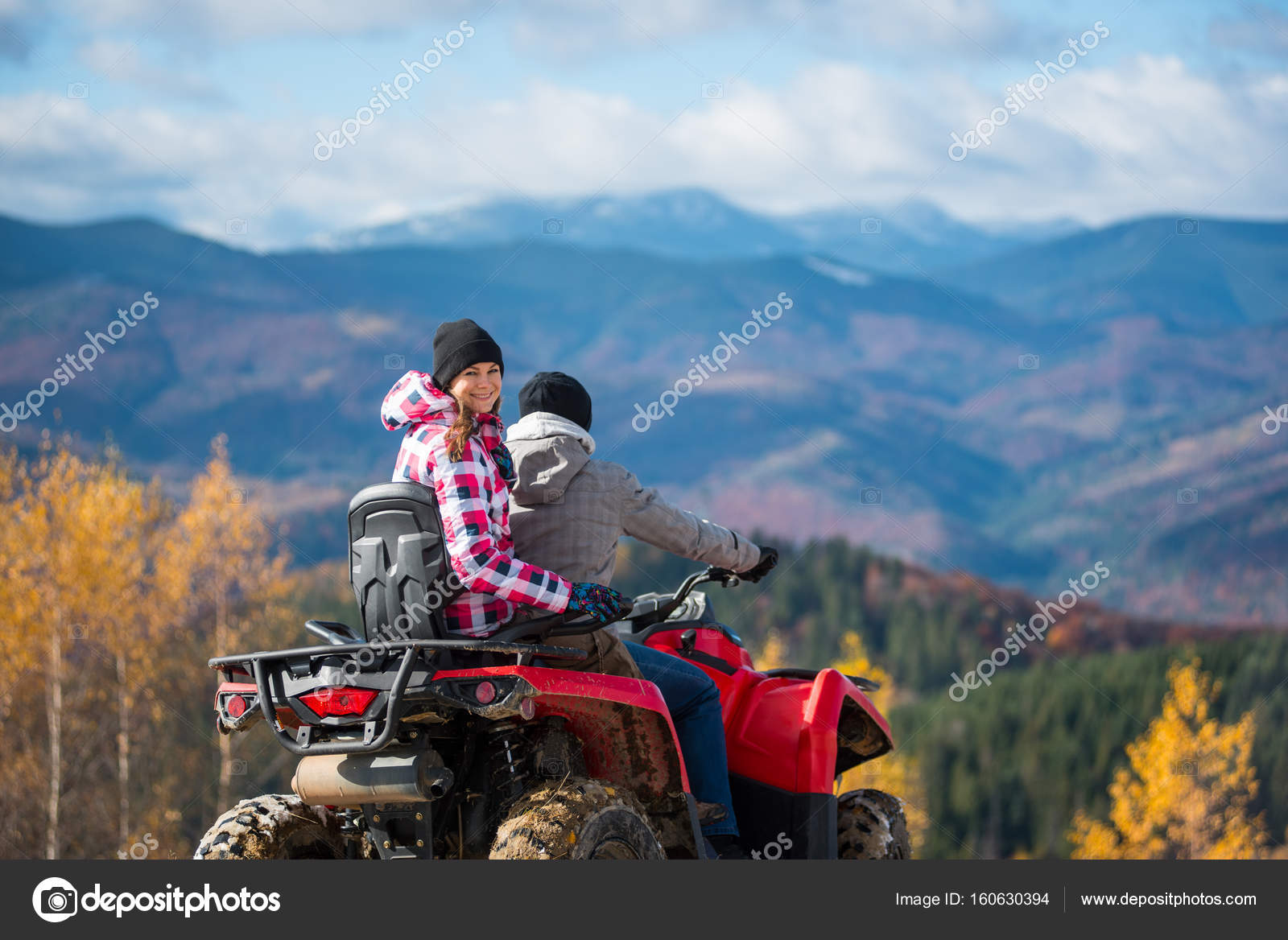 Couple on four-wheeler ATV in mountains Stock Photo by ©anatoliy_gleb  160630394