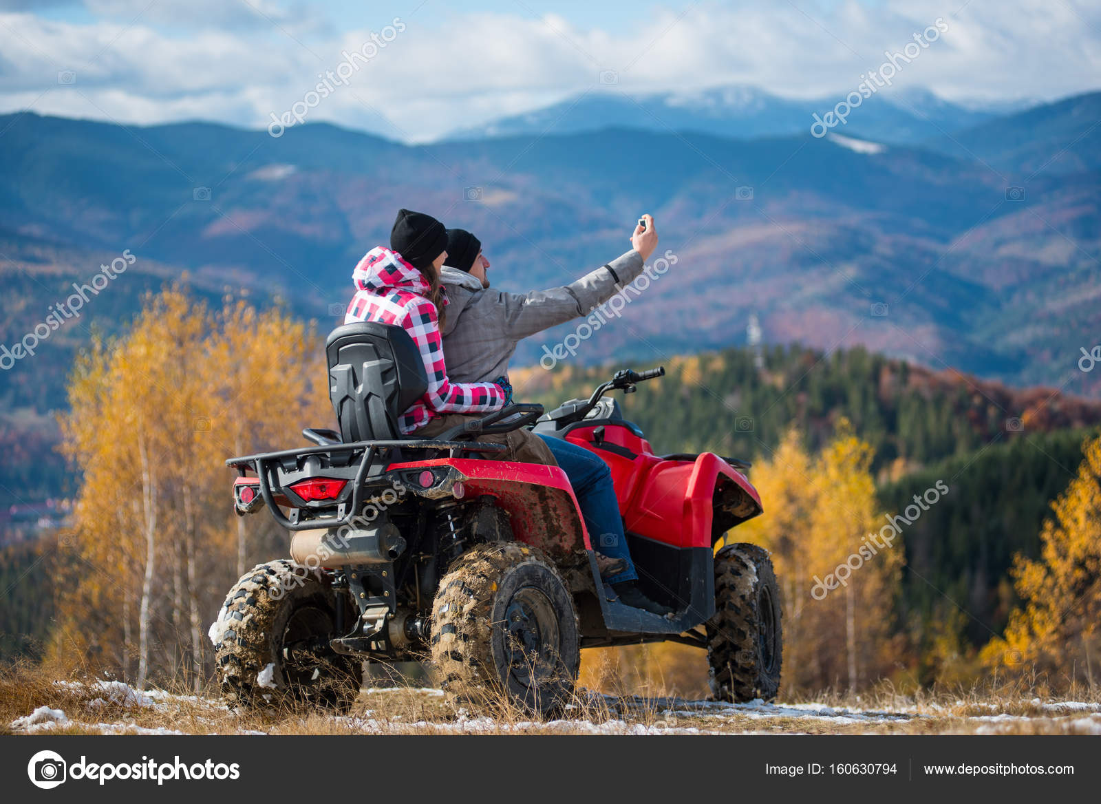 Couple on four-wheeler ATV in mountains Stock Photo by ©anatoliy_gleb  160630794