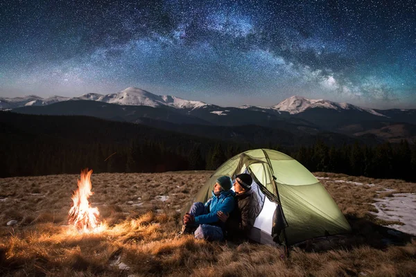 couple tourists enjoying in the camping