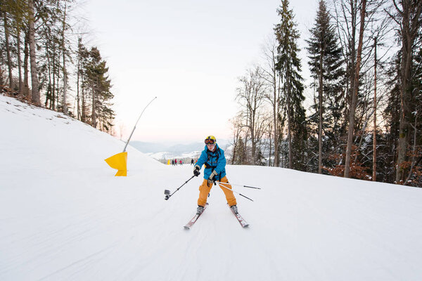Man on skis  taking selfie 
