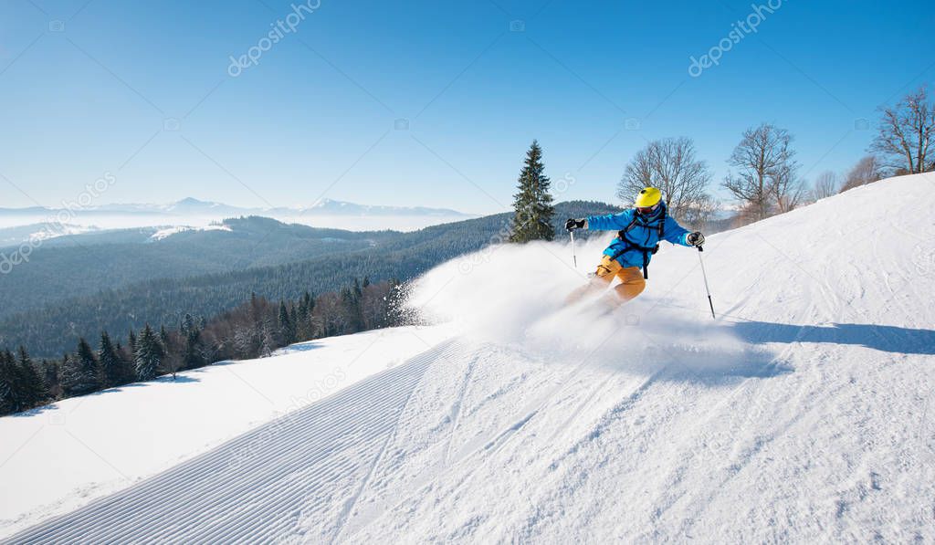 skier riding the slope 