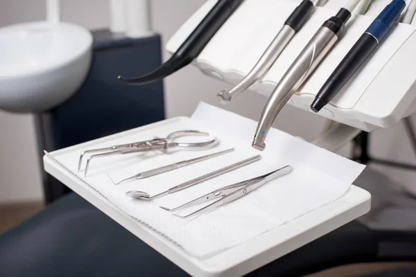 Different professional dental instruments in a dentist\'s office