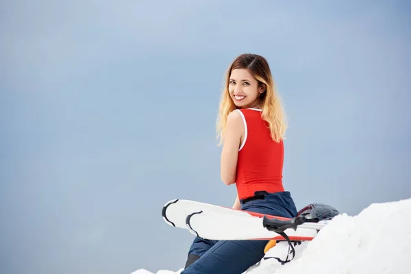 Cheerful young woman skier — Stock Photo, Image