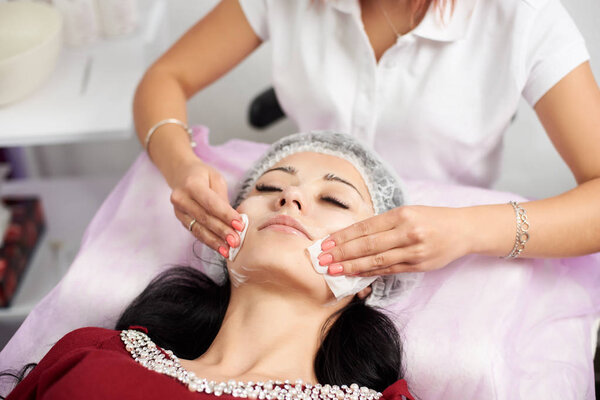 Drying facial wipes. Cosmetic procedures Mechanical cleaning of the face. Cosmetology.