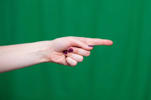 Пальцы рук женщины указывают — стоковое фото