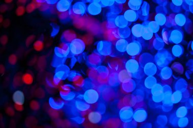 Siyah zemin üzerine kırmızı ve mavi bokeh soyut