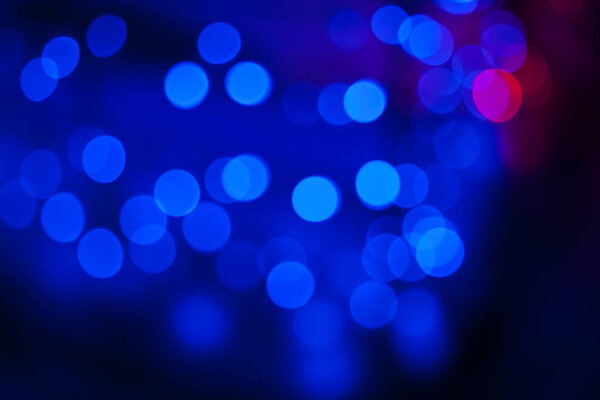 Blue bokeh abstract on a black background