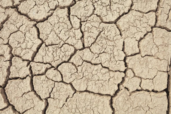 農村部の地球の亀裂 地面の質感の背景 乾燥土壌抽象的な写真 モザイク模様 — ストック写真