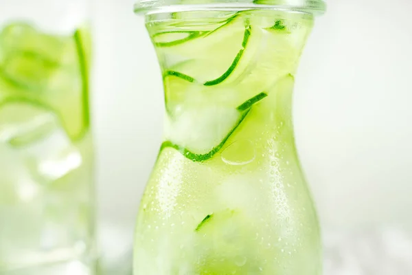 Cucumber infused water with ice, closeup view, horizontal orientation