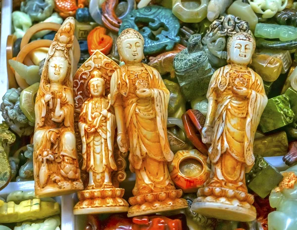 Çin çoğaltmasını plastik Buda Panjuan bit pazarı Beijing Çin — Stok fotoğraf