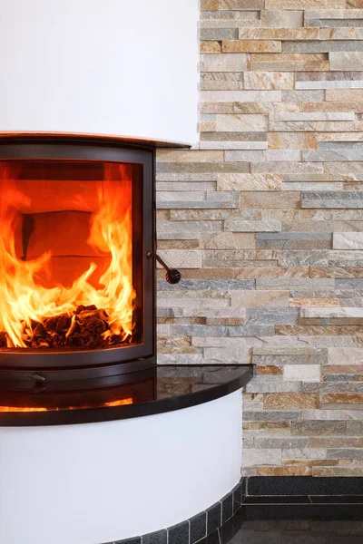 An interior shot of a modern marble fireplace