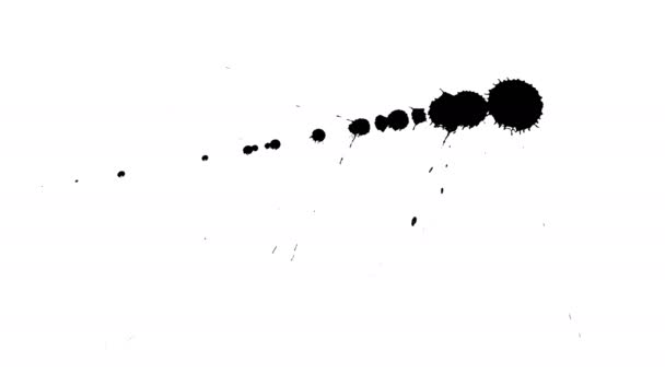 Tintas pretas caem em papel seco . — Vídeo de Stock