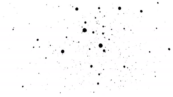 Black inks drop on dry paper. — Stock Video