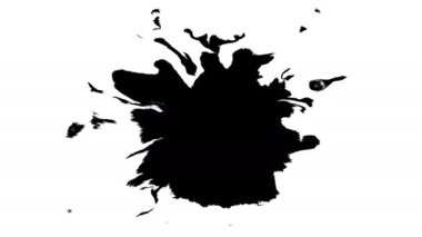 Siyah mürekkep kuru kağıt üzerinde damla.