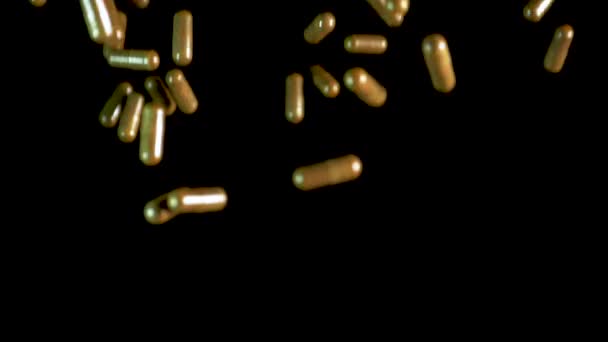 Pil capsules vallen op de tafel van de spiegel. Tikje geschoten, 180 fps — Stockvideo