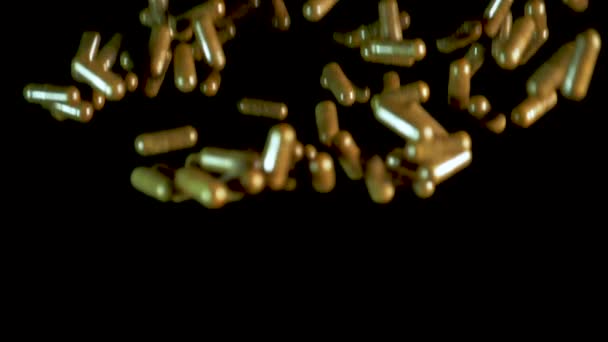 Pil capsules zijn geworpen in de lucht. Tikje geschoten, 180 fps — Stockvideo