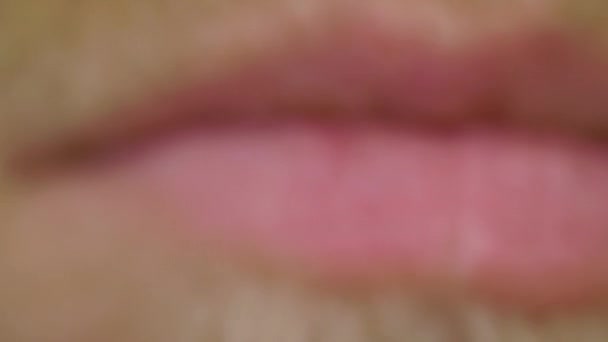 Close up shot of male lips with a mustache and beard — Stock Video