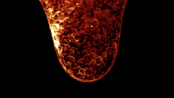 Colored mucus flowing from top to bottom on the dark background — Stock Video