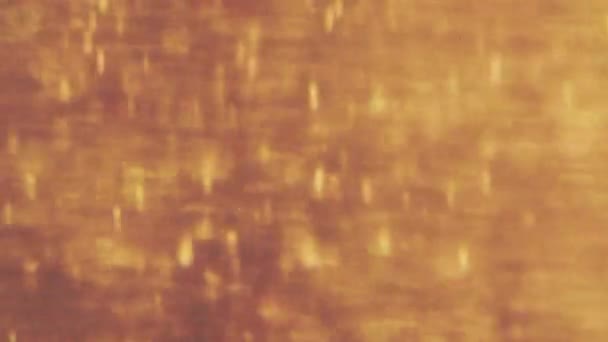 Abstrakcyjne złote cząstki z nieostrym bokeh porusza chaos, płatki śniegu — Wideo stockowe