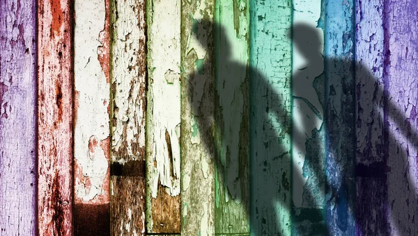 Forma de sombra borrada de gay na cor do arco-íris Madeira embutida — Fotografia de Stock