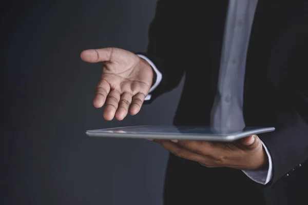 Businessman open hand to present digital tablet — Stock Photo, Image