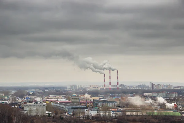 Dark smoke coming from the thermal power plant pipe. Factory smo — 스톡 사진