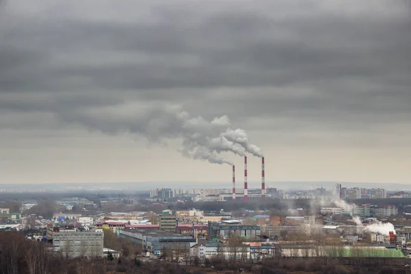 Dark smoke coming from the thermal power plant pipe. Factory smo — 스톡 사진
