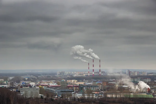 Dark smoke coming from the thermal power plant pipe. Factory smo — 스톡 사진