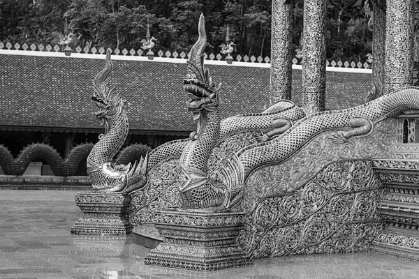 snake tile golden holy thai buddhism wat phraphutthabat si roi Thailand columns black white
