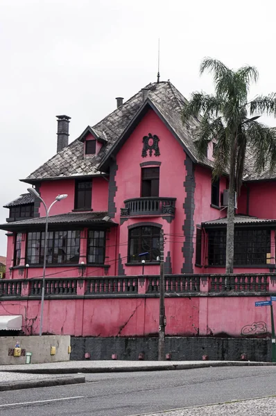 pink and black house architecture city Curitiba Brazil