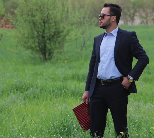 Nature of business man with glasses in hand book — Stock Photo, Image