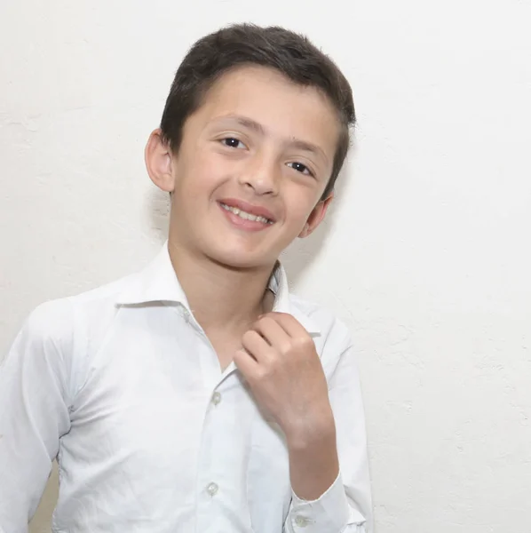 Close up of smiling cute young boy — Stock Photo, Image