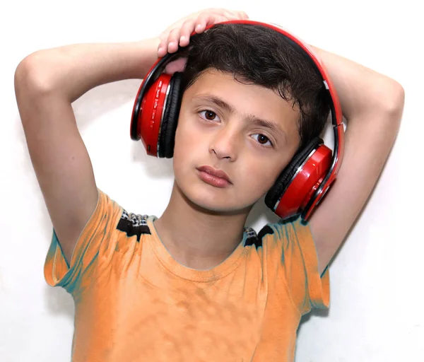 Little boy learning with headset on ear — Stock Photo, Image