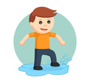 Küçük çocuk bir su birikintisine oynarken