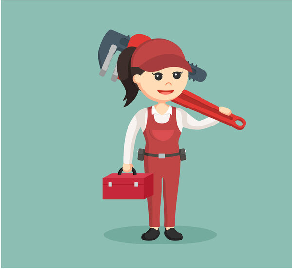 female plumber holding tool box and giant pipe wrench