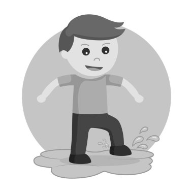 küçük çocuk bir su birikintisi siyah beyaz tarzda oynamak